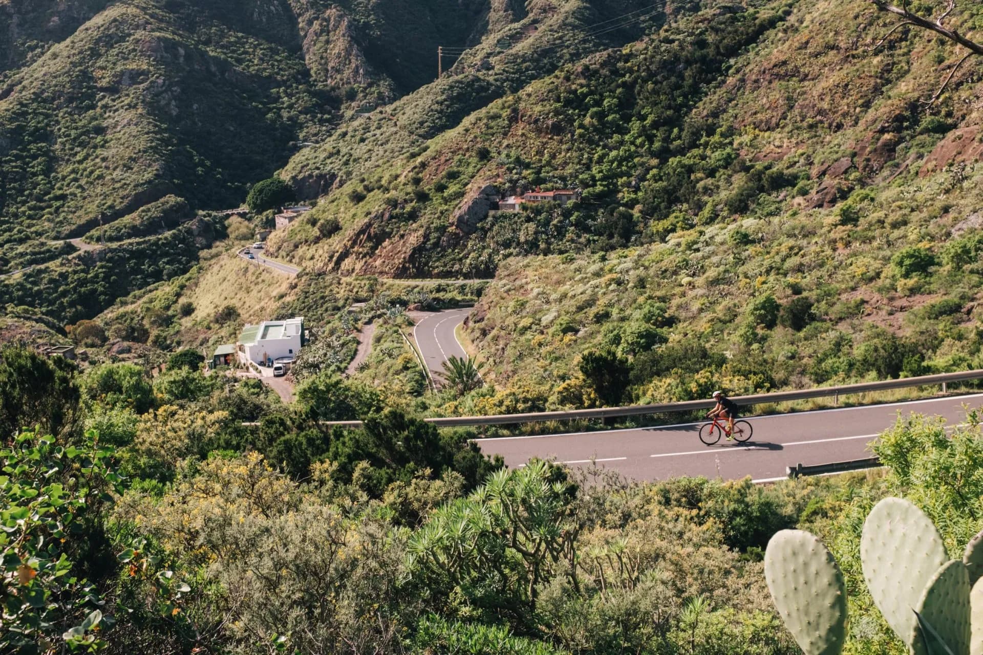 A cyclist on a mountain road