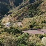 A cyclist on a mountain road