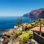 Giant rock formations known as Acantilados de Los Gigantes, located in Los Gigantes, a resort town in the Santiago del Teide municipality on the west coast of the Canary Island Tenerife, Spain