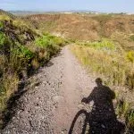 Rocky landscape and silhouette of cyclist